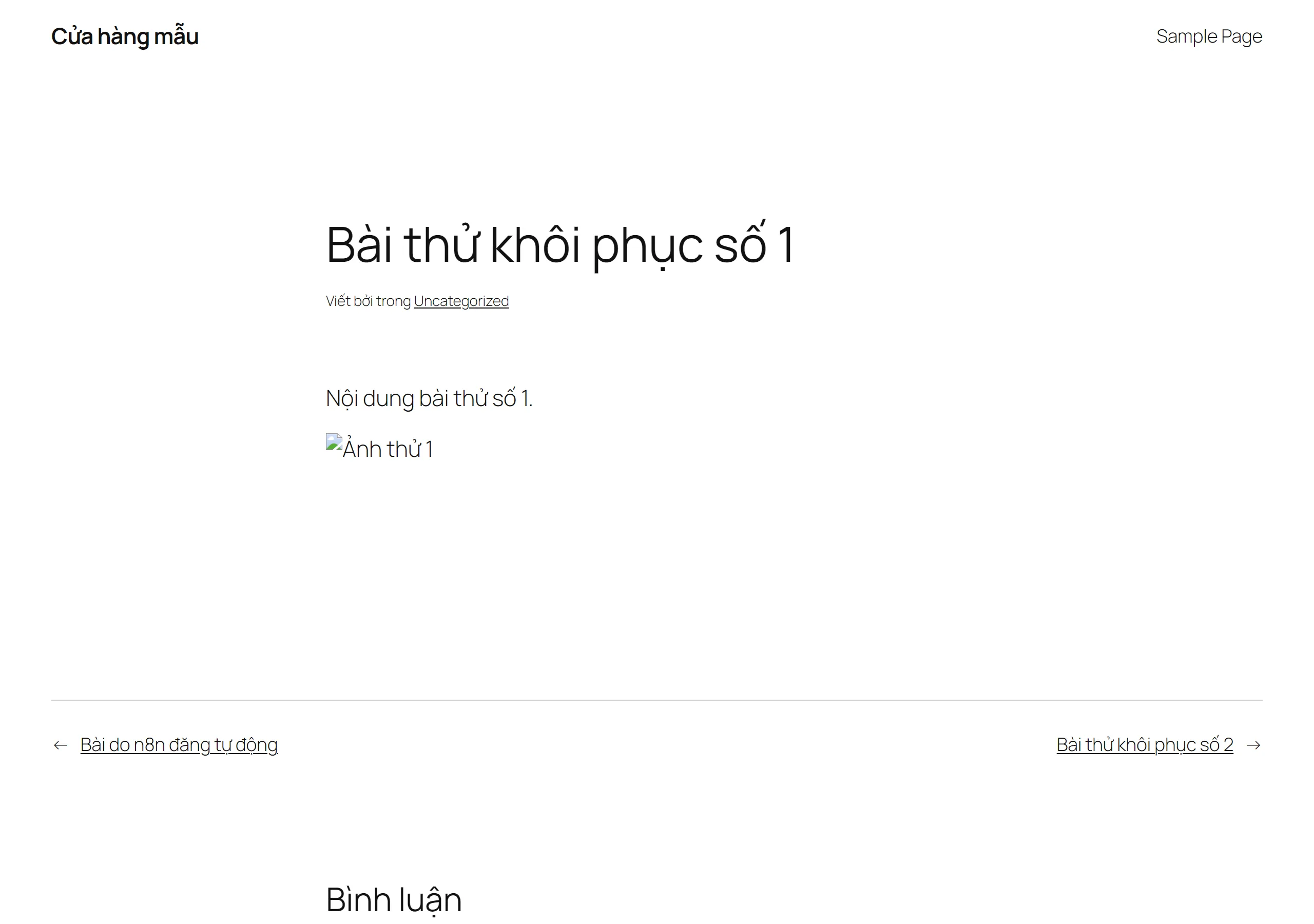 Trang bài Bài thử khôi phục số 1 trên site Cửa hàng mẫu sau khi chỉ khôi phục cơ sở dữ liệu. Tiêu đề và dòng Nội dung bài thử số 1 hiện bình thường, nhưng chỗ ảnh chỉ còn biểu tượng ảnh hỏng kèm chữ Ảnh thử 1.