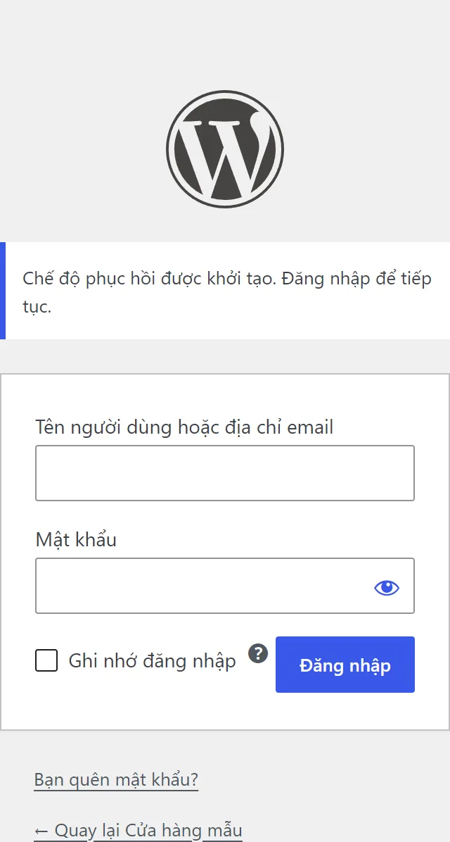 Trang đăng nhập WordPress sau khi mở link khôi phục: khung viền xanh ghi Chế độ phục hồi được khởi tạo. Đăng nhập để tiếp tục., bên dưới là ô Tên người dùng hoặc địa chỉ email, ô Mật khẩu và nút Đăng nhập.